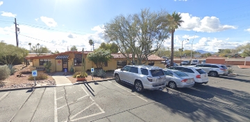 South view of Gloss Salon building from the parking lot