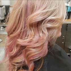 Blonde & pink hair coloration and styling by Angela Swaim